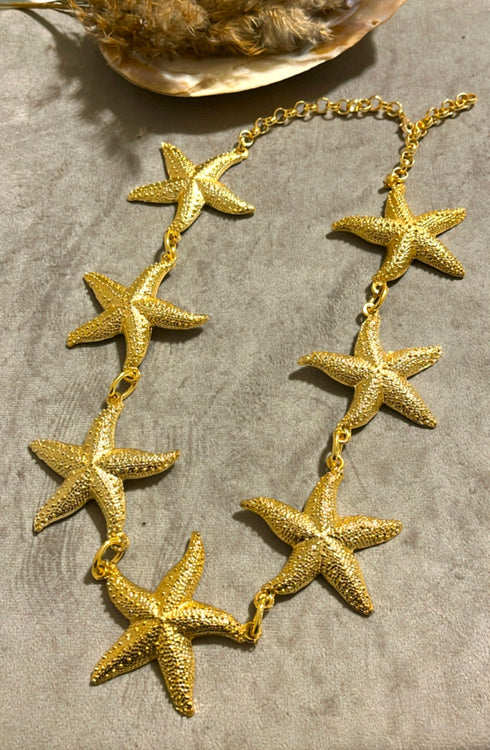 Gold toned Star fish